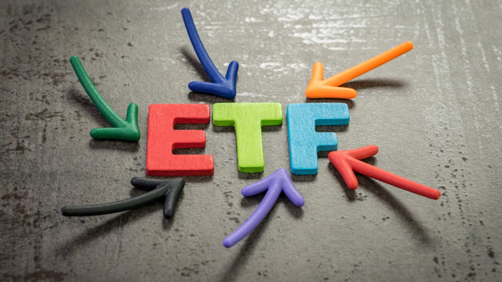 Colorful arrows pointing at the multicolored word
