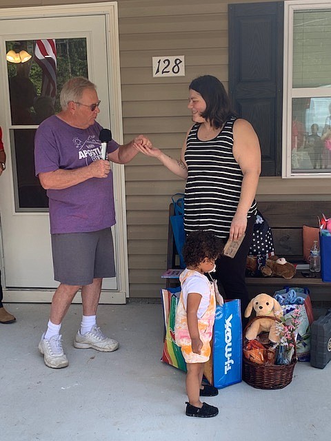 Local woman gets keys to new Habitat home