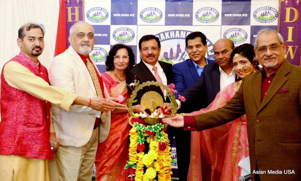 amp Lighting ceremony by USOGC President Chandan Singh along with Chief Guest Mrs. and Mr. Anil Loomba, Guest of Honor Consul Chicago Hon Vinod Gautham, Founder President AMEC & GSA Dr Vijay Prabhakar, FIA President Hitesh Gandi, USOGC Advisory Board Member Dr.  Ajit Pant and USOGC Past President Richa Chand